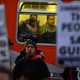 A passenger on a city bus observes a march in downtown Los Angeles on July 16, 2013, protesting the acquittal in Florida of George Zimmerman in the shooting death of Trayvon Martin.
Kevork Djansezian/Getty Images